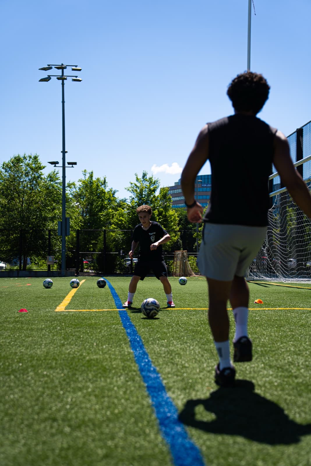 Player lining up a finishing drill in front of the goal during a Tekne session